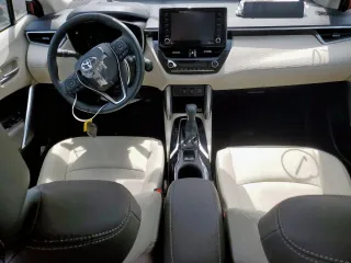 2022 Toyota Corolla Cross XLE with VIN 7MUDAAAG7NV019610, listed as a Copart auction lot 55146165 with 13,633 mi miles and Salvage title. Bid and sale history available at DreamBid. Image 8.