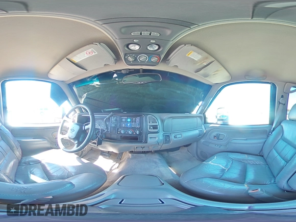 1999 Chevrolet Suburban with VIN 1GNEC16R1XJ394144, listed as a Copart auction lot 50418185 with 173,037 mi miles and Salvage title. Bid and sale history available at DreamBid. Image 12.