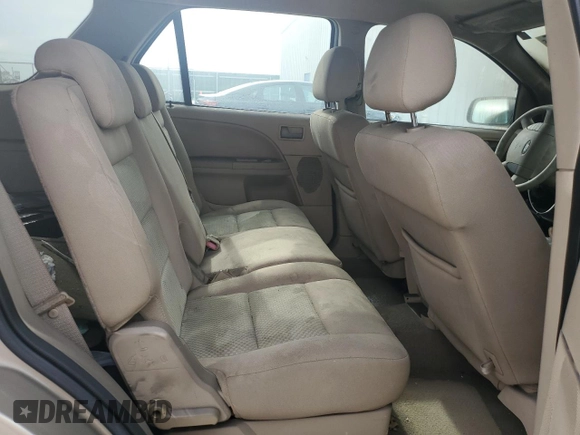 2006 Ford Freestyle SE z VIN 1FMZK01196GA26682, wystawiony jako Copart lot #54247755 z przebiegiem Nie podano mil oraz Szkody całkowita. Historia ofert i sprzedaży dostępna na DreamBid. Obrazek 10.