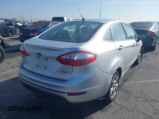 2016 Ford Fiesta SE with VIN 3FADP4BJ6GM205412, listed as a IAAI auction lot 41809126 with 100,941 mi miles. Bid and sale history available at carsss.com. Image 4.