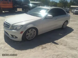 2009 Mercedes-Benz C-Class 3.0L Sport with VIN WDDGF54X59R056788, listed as a IAAI auction lot 42050204 with 213,706 mi miles. Bid and sale history available at carsss.com. Image 2.