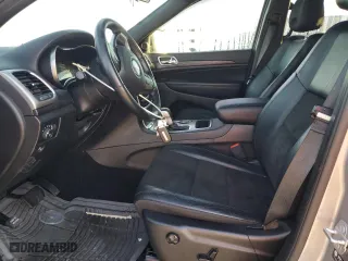 2021 Jeep Grand Cherokee Laredo X with VIN 1C4RJEAG0MC595613, listed as a Copart auction lot 84604214 with 51,971 mi miles and Salvage Title. Bid and sale history available at carsss.com. Image 7.