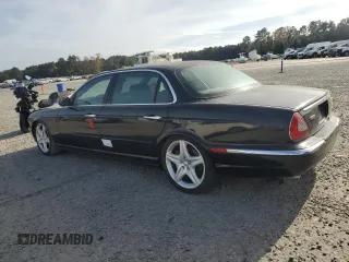2005 Jaguar XJ Vanden Plas with VIN SAJWA82B05TG47030, listed as a Copart auction lot 41040574 with 114,520 mi miles and Salvage Title. Bid and sale history available at carsss.com. Image 2.