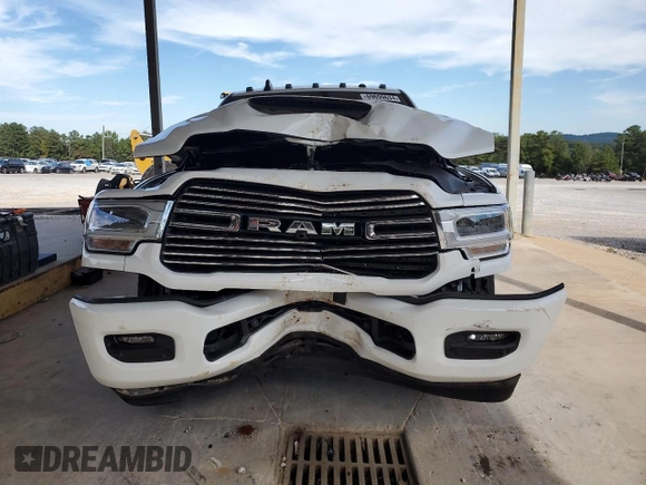 2023 Ram 3500 Laramie with VIN 3C63RRJL6PG522516, listed as a Copart auction lot 69699634 with 34,312 mi miles and Salvage Title. Bid and sale history available at carsss.com. Image 5.