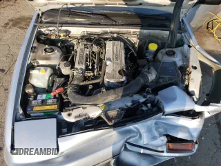 1990 Nissan 240SX z VIN JN1HS36P0LW121487, wystawiony jako Copart lot #70670904 z przebiegiem 123 794 mil mil oraz Szkody całkowita. Historia ofert i sprzedaży dostępna na DreamBid. Obrazek 11.