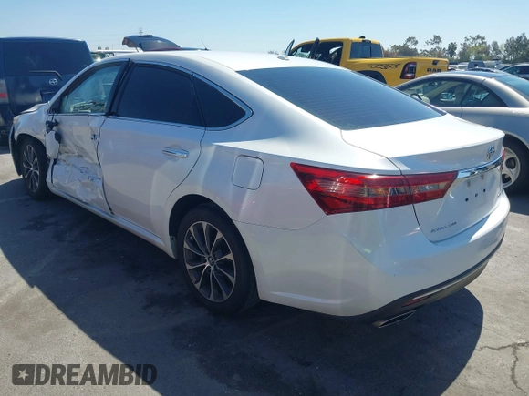 2016 Toyota Avalon Limited with VIN 4T1BK1EB4GU216774, listed as a IAAI auction lot 41861690 with 113,153 mi miles and . Bid and sale history available at carsss.com. Image 3.