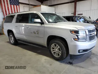 2020 Chevrolet Suburban LT with VIN 1GNSKHKC8LR252336, listed as a Copart auction lot 61094985 with 323,387 mi miles and Clean title. Bid and sale history available at DreamBid. Image 4.