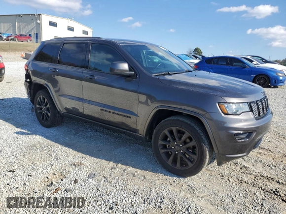 2020 Jeep Grand Cherokee Laredo E with VIN 1C4RJEAG8LC391401, listed as a Copart auction lot 80630874 with 122,083 mi miles and Salvage title. Bid and sale history available at DreamBid. Image 4.