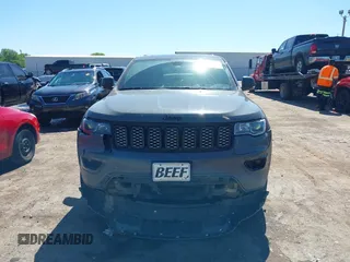 2019 Jeep Grand Cherokee Laredo E with VIN 1C4RJFAG8KC849782, listed as a IAAI auction lot 42151331 with 141,099 mi miles and . Bid and sale history available at DreamBid. Image 12.