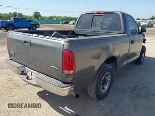 2003 Ford F-150 XL with VIN 1FTRF17273NB64646, listed as a IAAI auction lot 41986850 with 180,601 mi miles. Bid and sale history available at carsss.com. Image 4.