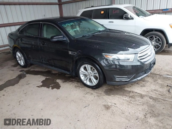 2015 Ford Taurus SEL z VIN 1FAHP2E87FG203272, wystawiony jako IAAI lot #41717231 z przebiegiem 95 829 mil mil oraz . Historia ofert i sprzedaży dostępna na DreamBid. Obrazek 1.