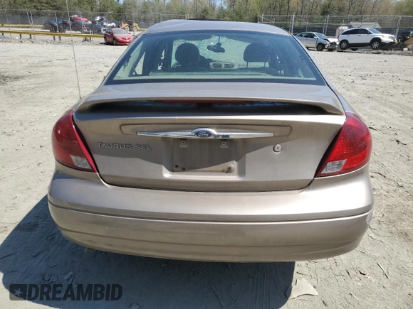 2003 Ford Taurus SEL Deluxe with VIN 1FAHP56SX3G199970, listed as a Copart auction lot 53042795 with 212,802 mi miles and Salvage Title. Bid and sale history available at DreamBid. Image 6.
