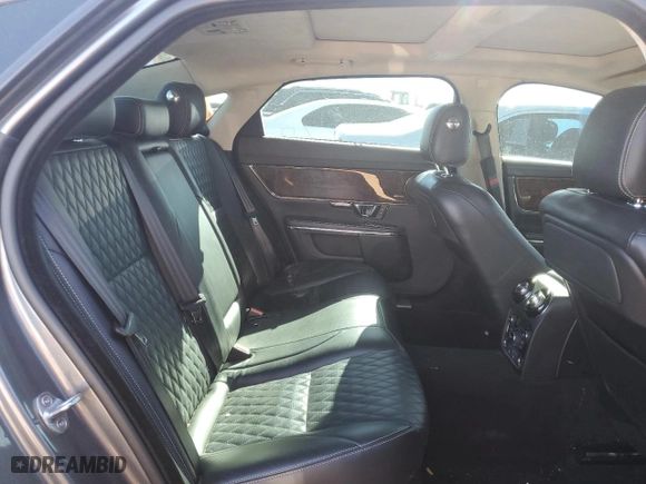 2016 Jaguar XJ with VIN SAJWJ2GD3G8W03257, listed as a Copart auction lot 76550324 with NaN miles and Salvage Title. Bid and sale history available at carsss.com. Image 10.