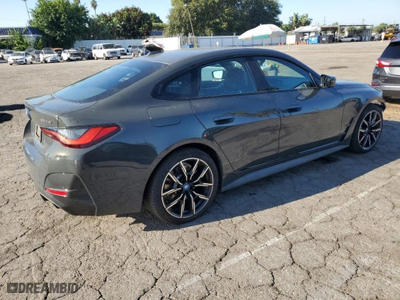 2023 BMW i4 eDrive40 with VIN WBY73AW08PFN97116, listed as a Copart auction lot 67344213 with 12,299 mi miles. Bid and sale history available at carsss.com. Image 3.