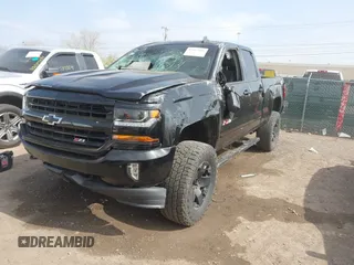 2017 Chevrolet Silverado 1500 LT with VIN 1GCVKRECXHZ157839, listed as a IAAI auction lot 42067806 with 132,135 mi miles and . Bid and sale history available at DreamBid. Image 2.