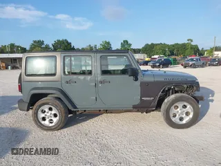 2014 Jeep Wrangler Unlimited Sport with VIN 1C4BJWDG5EL327225, listed as a IAAI auction lot 42547991 with 129,545 mi miles and . Bid and sale history available at DreamBid. Image 13.