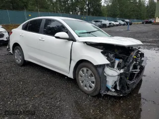 2022 Kia Rio S with VIN 3KPA24AD7NE448158, listed as a Copart auction lot 52122265 with 0 mi miles and Salvage Title. Bid and sale history available at carsss.com. Image 4.