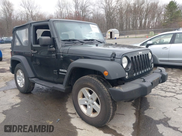 2014 Jeep Wrangler Sport with VIN 1C4AJWAG9EL312856, listed as a IAAI auction lot 42022870 with 98,323 mi miles and . Bid and sale history available at DreamBid. Image 1.