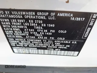 2018 Volkswagen Atlas SEL z VIN 1V2MR2CA3JC536009, wystawiony jako IAAI lot #40205798 z przebiegiem 125 945 mil mil oraz . Historia ofert i sprzedaży dostępna na DreamBid. Obrazek 9.
