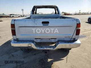 1991 Toyota Pickup DLX z VIN JT4VN13D7M5045456, wystawiony jako Copart lot #77028624 z przebiegiem Nie podano mil oraz Nie do naprawy • Non repairable. Historia ofert i sprzedaży dostępna na DreamBid. Obrazek 6.