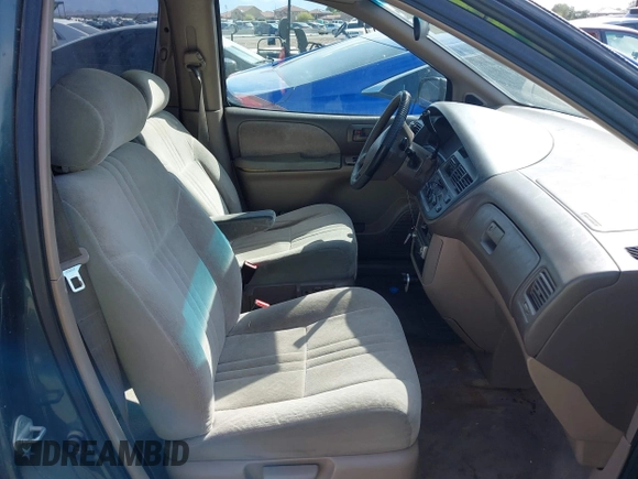 1998 Toyota Sienna LE with VIN 4T3ZF13CXWU049115, listed as a IAAI auction lot 42193159 with 194,313 mi miles and . Bid and sale history available at DreamBid. Image 5.