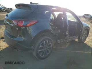 2016 Mazda CX-5 Grand Touring with VIN JM3KE4DY0G0731384, listed as a Copart auction lot 44741695 with 58,727 mi miles and Salvage Title. Bid and sale history available at carsss.com. Image 3.