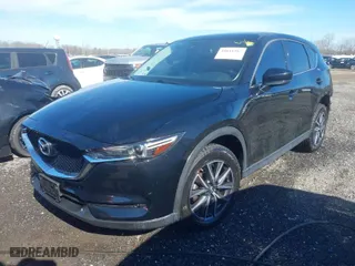 2017 Mazda CX-5 Grand Touring with VIN JM3KFBDL0H0228056, listed as a IAAI auction lot 41611567 with 85,294 mi miles. Bid and sale history available at carsss.com. Image 2.