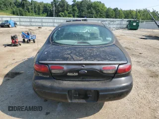 1998 Ford Taurus LX z VIN 1FAFP52U9WA174855, wystawiony jako Copart lot #66728184 z przebiegiem 104 796 mil mil oraz Szkody całkowita. Historia ofert i sprzedaży dostępna na DreamBid. Obrazek 6.