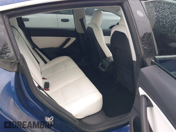 2019 Tesla Model 3 Long Range with VIN 5YJ3E1EB8KF512950, listed as a IAAI auction lot 41836349 with 55,607 mi miles and . Bid and sale history available at DreamBid. Image 8.