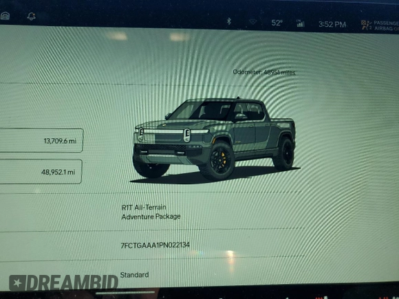 2023 Rivian R1T Adventure z VIN 7FCTGAAA1PN022134, wystawiony jako Copart lot #85545774 z przebiegiem 48 951 mil mil oraz Szkoda całkowita • Salvage title. Historia ofert i sprzedaży dostępna na DreamBid. Obrazek 9.