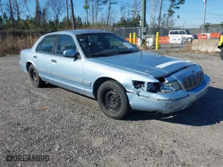 1999 Mercury Grand Marquis GS with VIN 2MEFM74W9XX721904, listed as a IAAI auction lot 41235201 with 161,669 mi miles. Bid and sale history available at carsss.com. Image 1.