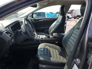 2016 Ford Fusion Energi SE Luxury with VIN 3FA6P0PU6GR310541, listed as a Copart auction lot 52297815 with 122,985 mi miles and Non Repairable. Bid and sale history available at carsss.com. Image 7.