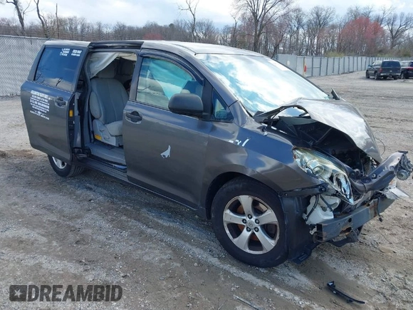 2014 Toyota Sienna L with VIN 5TDZK3DC4ES407928, listed as a IAAI auction lot 41887349 with 208,289 mi miles. Bid and sale history available at carsss.com. Image 1.