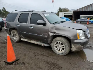 2014 GMC Yukon Denali z VIN 1GKS1EEF7ER222591, wystawiony jako Copart lot #42623745 z przebiegiem 211 992 mil mil oraz Szkoda całkowita • Salvage title. Historia ofert i sprzedaży dostępna na DreamBid. Obrazek 4.