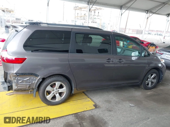 2015 Toyota Sienna LE AAS with VIN 5TDKK3DC8FS585957, listed as a IAAI auction lot 41888825 with 157,364 mi miles and . Bid and sale history available at DreamBid. Image 14.