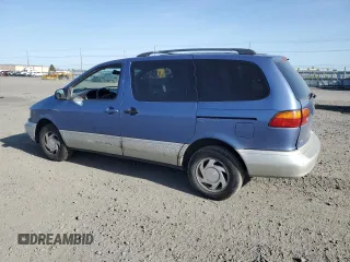 1998 Toyota Sienna LE with VIN 4T3ZF13CXWU011884, listed as a Copart auction lot 54601885 with 205,989 mi miles and Salvage Title. Bid and sale history available at carsss.com. Image 2.