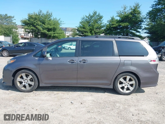 2012 Toyota Sienna SE with VIN 5TDXK3DCXCS267405, listed as a IAAI auction lot 42401101 with 134,553 mi miles and . Bid and sale history available at DreamBid. Image 14.
