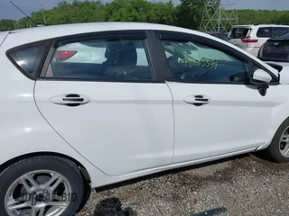 2018 Ford Fiesta SE z VIN 3FADP4EJXJM100407, wystawiony jako IAAI lot #42285374 z przebiegiem 90 261 mil mil oraz . Historia ofert i sprzedaży dostępna na DreamBid. Obrazek 13.