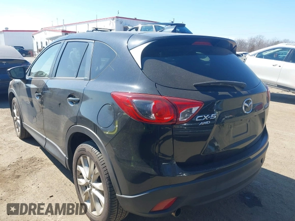2014 Mazda CX-5 Grand Touring with VIN JM3KE4DY1E0339690, listed as a IAAI auction lot 41668780 with 216,825 mi miles. Bid and sale history available at carsss.com. Image 3.