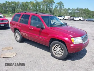 2004 Jeep Grand Cherokee Limited with VIN 1J4GX58N34C401838, listed as a IAAI auction lot 42714681 with 205,477 mi miles and . Bid and sale history available at DreamBid. Image 1.