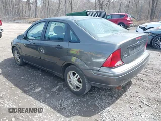 2004 Ford Focus SE with VIN 1FAFP34Z64W145178, listed as a IAAI auction lot 41962429 with 274,025 mi miles and . Bid and sale history available at DreamBid. Image 3.