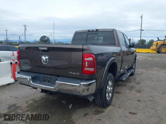 2020 Ram 2500 Laramie z VIN 3C6UR5FL5LG249102, wystawiony jako IAAI lot #41414195 z przebiegiem 42 044 mil mil oraz . Historia ofert i sprzedaży dostępna na DreamBid. Obrazek 4.