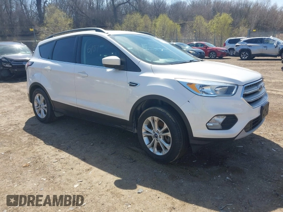 2018 Ford Escape SE z VIN 1FMCU9GD4JUB06181, wystawiony jako IAAI lot #42046708 z przebiegiem 160 987 mil mil oraz . Historia ofert i sprzedaży dostępna na DreamBid. Obrazek 1.