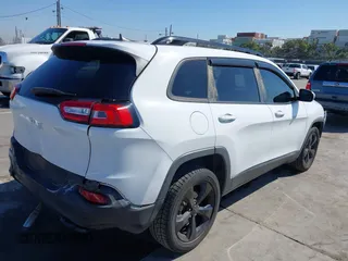 2016 Jeep Cherokee 75th Anniversary with VIN 1C4PJLCB9GW107422, listed as a IAAI auction lot 41997941 with 121,641 mi miles and . Bid and sale history available at carsss.com. Image 4.
