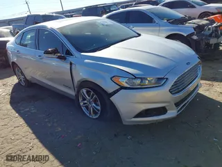 2016 Ford Fusion Titanium Hybrid with VIN 3FA6P0RU7GR364573, listed as a IAAI auction lot 41298298 with 189,900 mi miles. Bid and sale history available at carsss.com. Image 1.