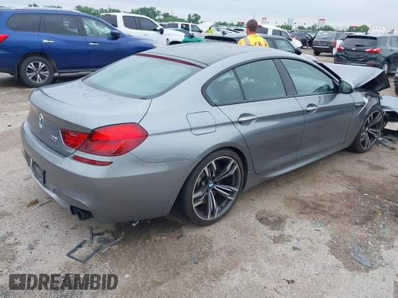 2014 BMW M6 with VIN WBS6C9C54EDV73926, listed as a IAAI auction lot 42421586 with 82,216 mi miles and . Bid and sale history available at DreamBid. Image 4.