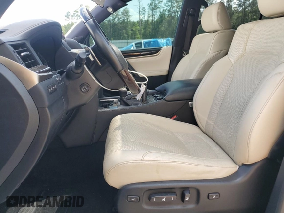 2020 Lexus LX 570 with VIN JTJDY7AX6L4332372, listed as a Copart auction lot 57315675 with 132,418 mi miles and Salvage title. Bid and sale history available at DreamBid. Image 7.