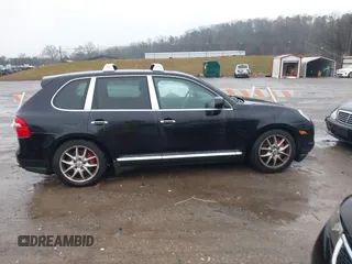 2008 Porsche Cayenne Turbo with VIN WP1AC29P28LA97203, listed as a IAAI auction lot 41541313 with 192,281 mi miles. Bid and sale history available at carsss.com. Image 13.