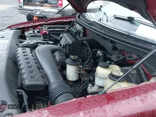 2004 Ford F-150 XLT z VIN 1FTPW145X4KC33015, wystawiony jako IAAI lot #43413631 z przebiegiem 156 838 mil mil oraz . Historia ofert i sprzedaży dostępna na DreamBid. Obrazek 17.