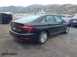 2019 Volkswagen Jetta S with VIN 3VWCB7BU9KM183136, listed as a IAAI auction lot 41777684 with 101,448 mi miles. Bid and sale history available at carsss.com. Image 4.